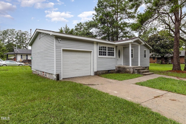 view of front of property with a garage and a front lawn