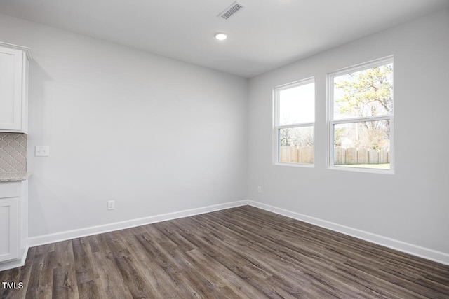 interior space with dark hardwood / wood-style floors