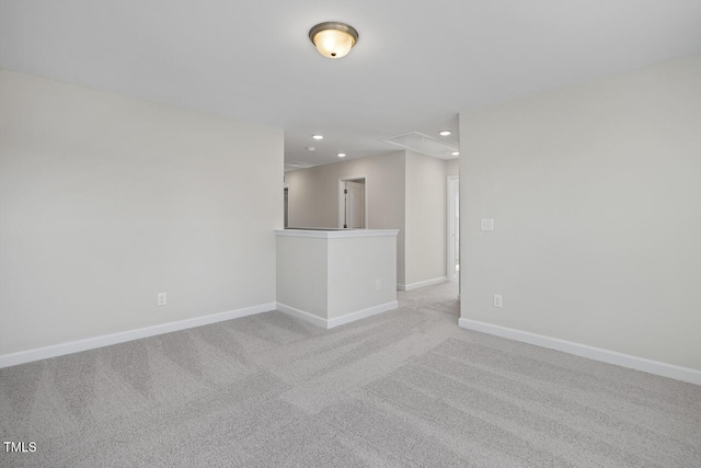 empty room with light colored carpet