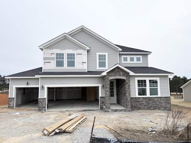 view of front of property with a garage