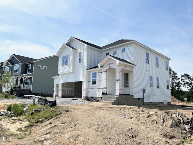 view of front of property featuring a garage