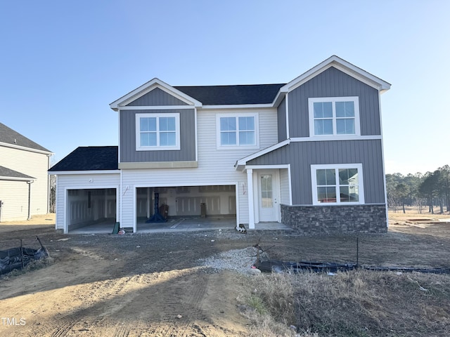 view of front of property featuring a garage