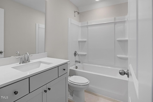 bathroom with vanity, shower / bathing tub combination, and toilet