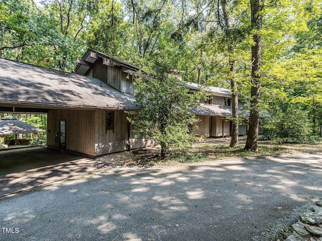 view of front of home with a carport