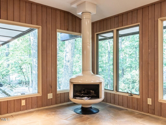 unfurnished sunroom with a wealth of natural light and ornate columns