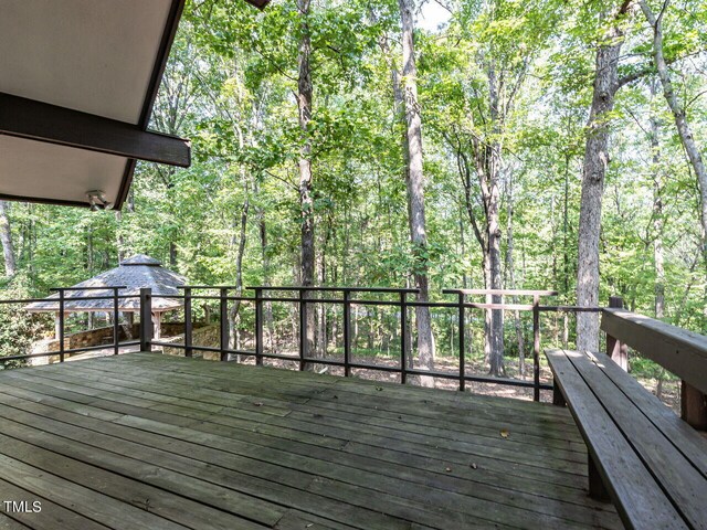 wooden deck with a gazebo