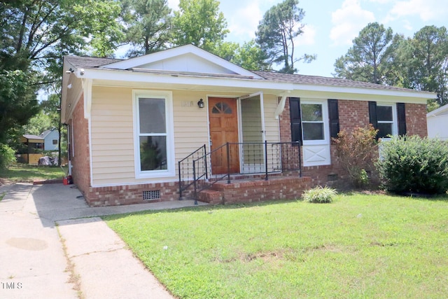 view of front of house with a front yard