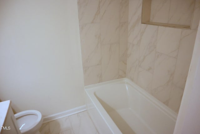 bathroom with vanity, toilet, and tile patterned floors