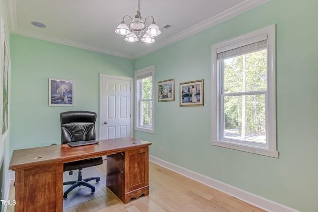 office with crown molding, light wood-style floors, baseboards, and a wealth of natural light