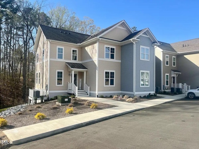 view of front of house with cooling unit