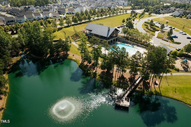 birds eye view of property with a residential view and a water view