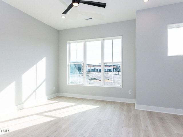 spare room with light wood finished floors, baseboards, visible vents, ceiling fan, and recessed lighting