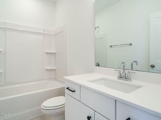 bathroom with shower / tub combination, vanity, and toilet