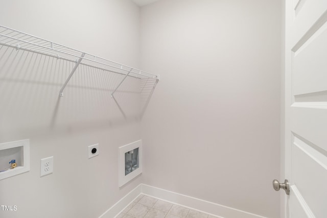 laundry area with light tile patterned flooring, electric dryer hookup, and washer hookup