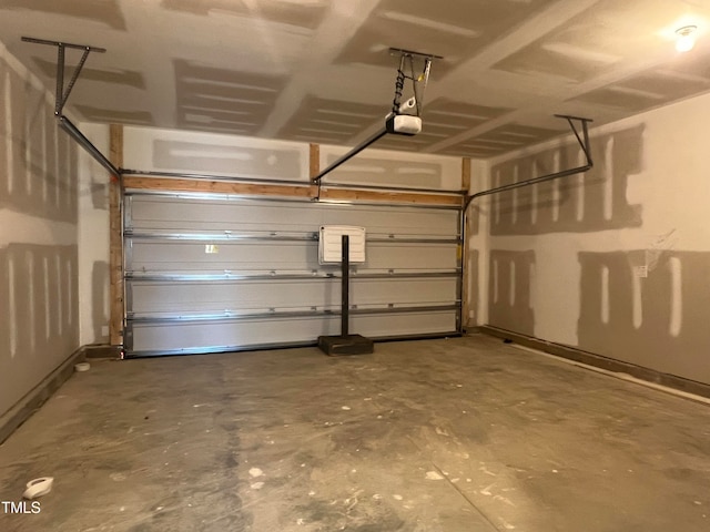 garage featuring a garage door opener