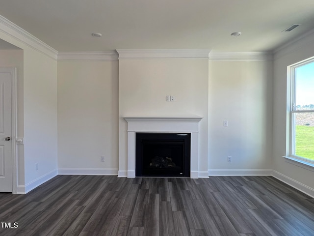 unfurnished living room with crown molding and dark wood-type flooring