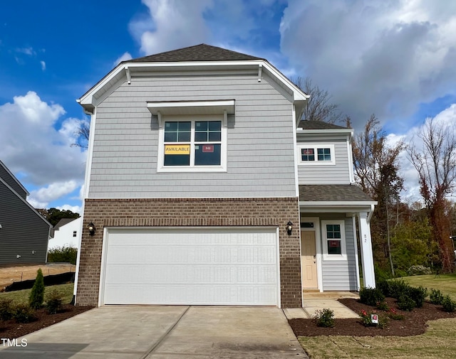 view of front of property featuring a garage