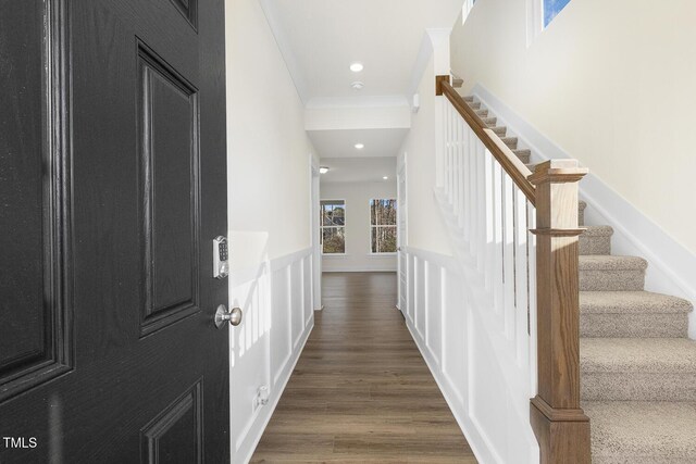 82 Gander Dr, Benson, NC 27504 - hallway featuring dark wood finished floors, stairway, recessed lighting, and ornamental molding