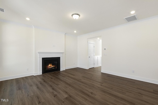 82 Gander Dr, Benson, NC 27504 - unfurnished living room with baseboards, dark wood-style floors, visible vents, and ornamental molding