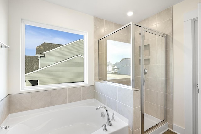 82 Gander Dr, Benson, NC 27504 - bathroom with a stall shower and a garden tub
