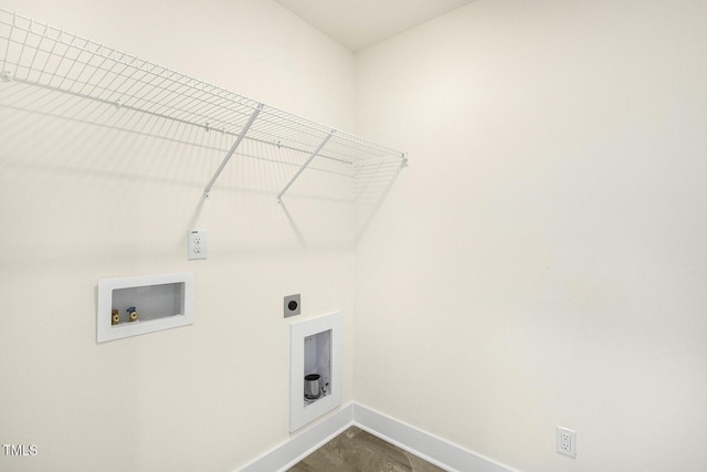 82 Gander Dr, Benson, NC 27504 - laundry area featuring laundry area, hookup for a washing machine, electric dryer hookup, and baseboards