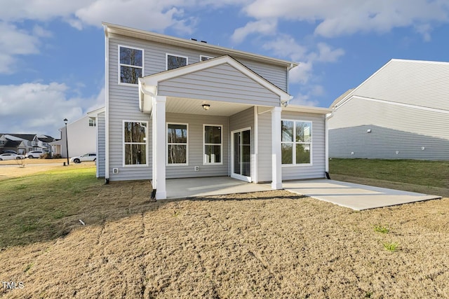 82 Gander Dr, Benson, NC 27504 - rear view of property with a yard and a patio