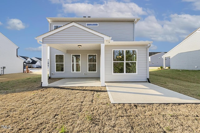 82 Gander Dr, Benson, NC 27504 - rear view of house featuring a patio area and a lawn