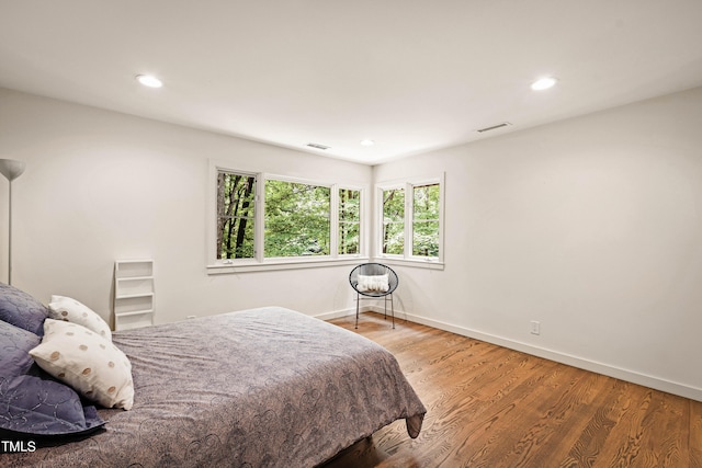 bedroom featuring hardwood / wood-style flooring