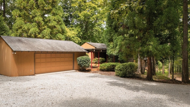 view of front of property with driveway and a garage