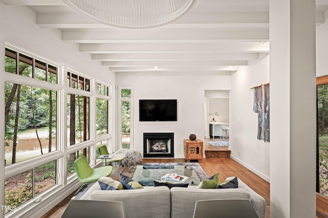 sunroom / solarium with beam ceiling and a wealth of natural light