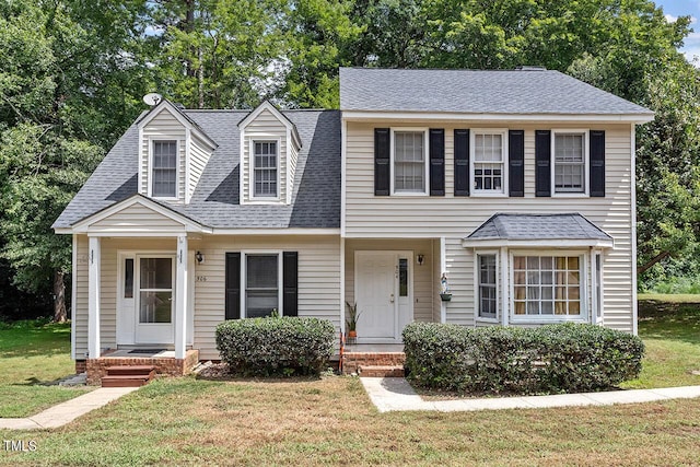 view of front of home featuring a front lawn