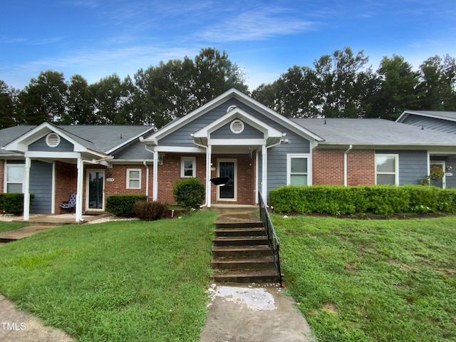 view of front of house with a front lawn