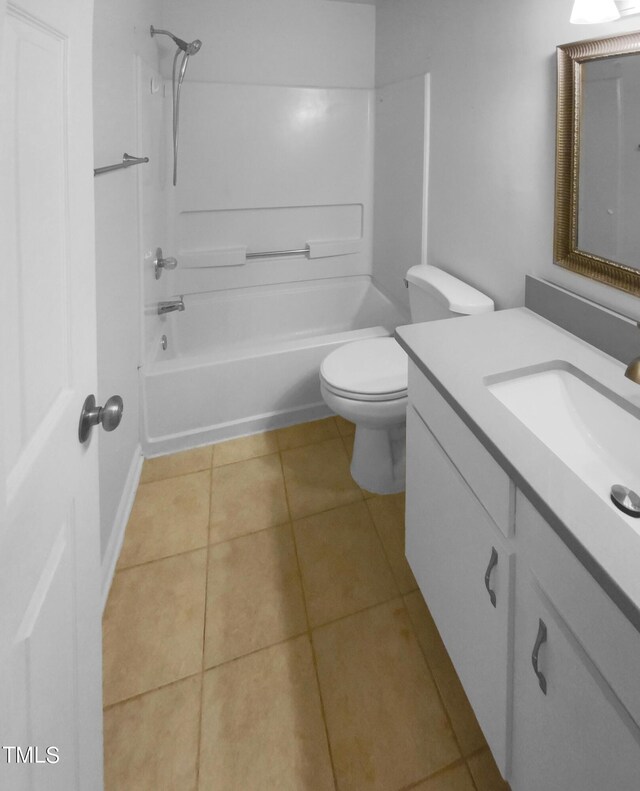 full bathroom with toilet, tile patterned floors, vanity, and bathing tub / shower combination