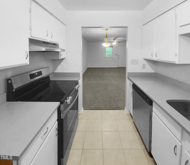 603 Pine Forest Trl, Knightdale, NC 27545 - kitchen featuring pendant lighting, sink, white cabinets, stainless steel appliances, and light carpet