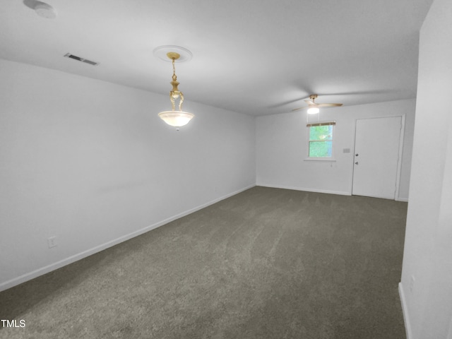603 Pine Forest Trl, Knightdale, NC 27545 - unfurnished room with dark colored carpet and ceiling fan