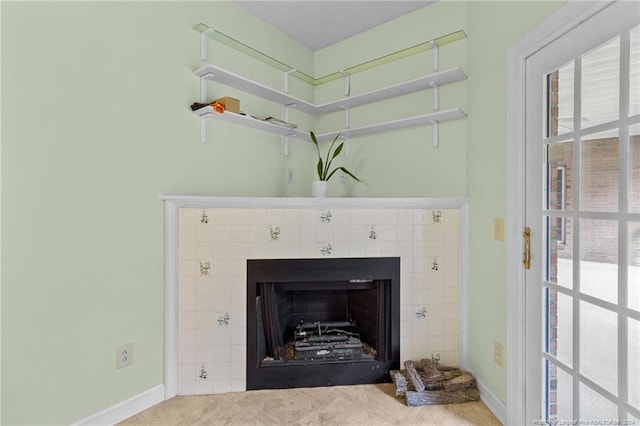 details featuring a fireplace and tile patterned flooring