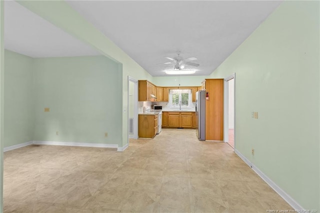 kitchen with stainless steel appliances and ceiling fan