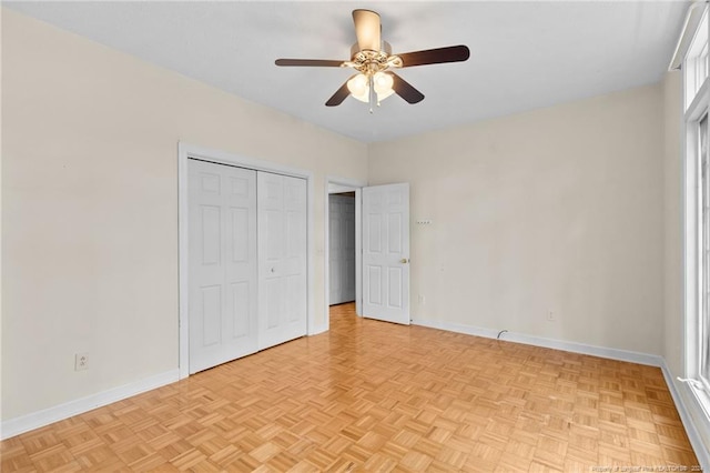 unfurnished bedroom featuring ceiling fan and light parquet floors