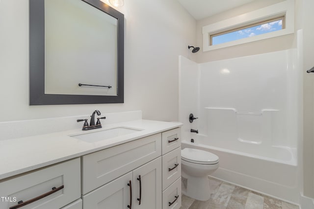 full bathroom featuring shower / bath combination, vanity, and toilet