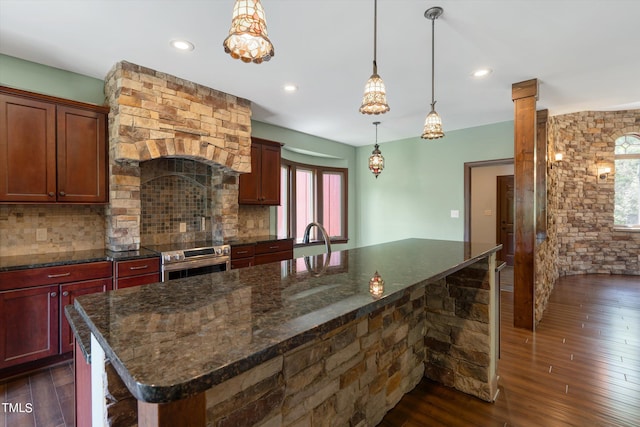 3240 Hillcastle Trl, Chapel Hill, NC 27516 - kitchen with stainless steel range with electric cooktop, healthy amount of natural light, dark wood finished floors, decorative backsplash, and recessed lighting