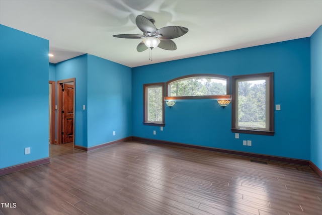 unfurnished room with wood-type flooring and ceiling fan