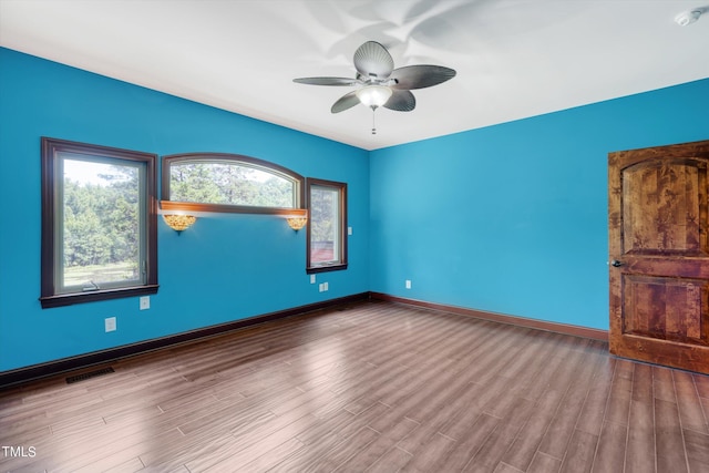 3240 Hillcastle Trl, Chapel Hill, NC 27516 - unfurnished room featuring a ceiling fan, wood finished floors, and a smoke detector