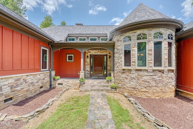 3240 Hillcastle Trl, Chapel Hill, NC 27516 - property entrance with stone siding and a shingled roof