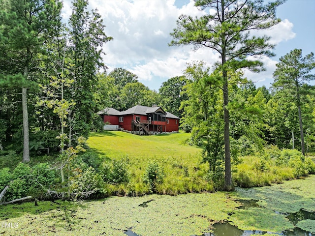 view of yard with a wooden deck