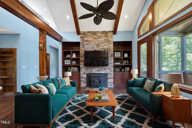 living room with ceiling fan, built in features, beamed ceiling, high vaulted ceiling, and hardwood / wood-style floors