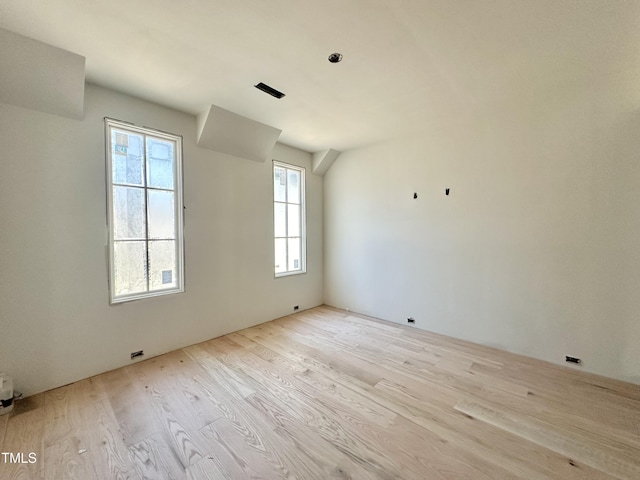 empty room featuring wood finished floors