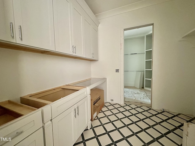 laundry room featuring light floors
