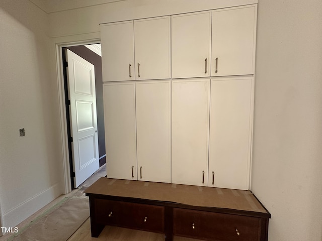 mudroom featuring baseboards