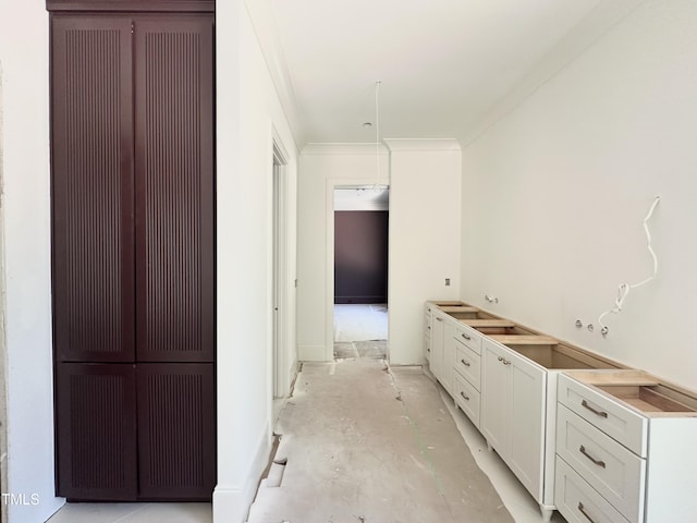 interior space featuring crown molding