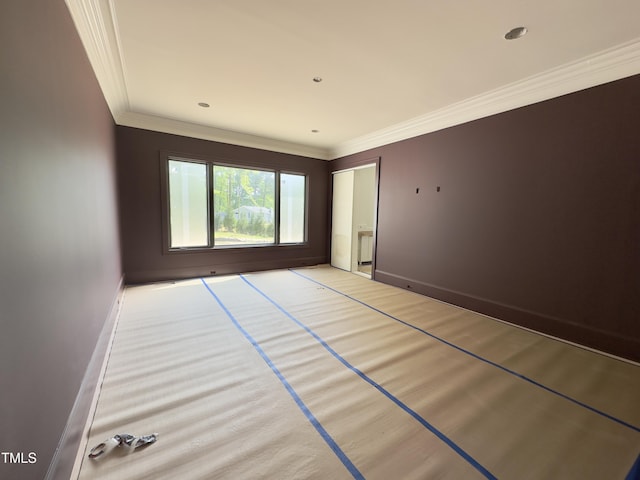 7208 Tanbark Way, Raleigh, NC 27615 - unfurnished room featuring crown molding and baseboards
